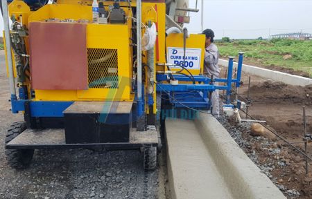Máy bó vỉa cốp pha trượt