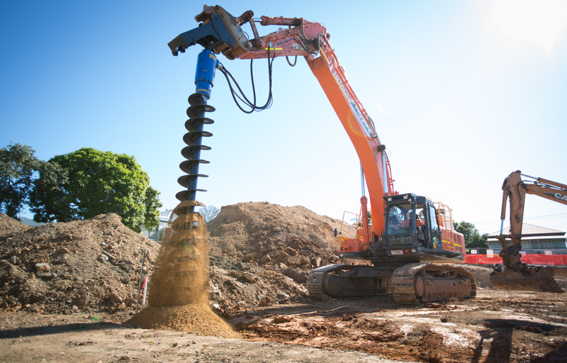 Máy khoan đất thủy lực Augertorque gắn xe đào